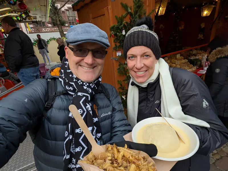 A bowl of something hot at the stalls — the Christmas market in Freiburg im Breisgau, Germany