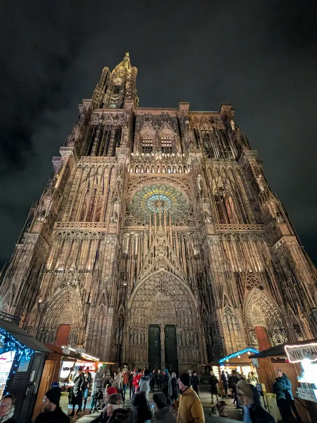 The west front of Strasbourg Cathedral after dark