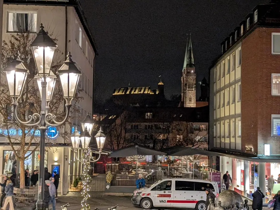 Street lamps and the market roofs at dusk
