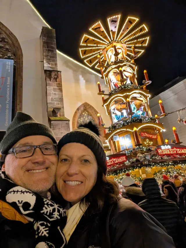 At the Christmas market stalls after dark