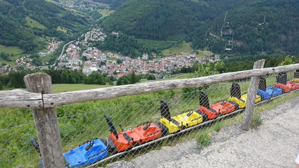 Toboggan carts racked up at the top station