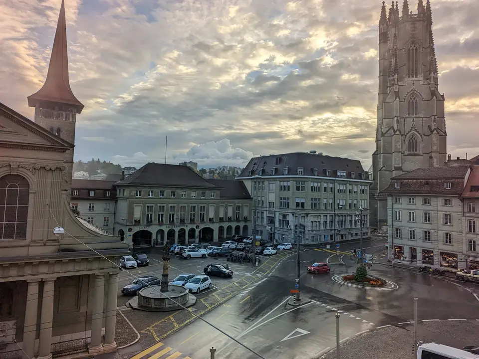 The square at dusk, the tower of St Nicholas above