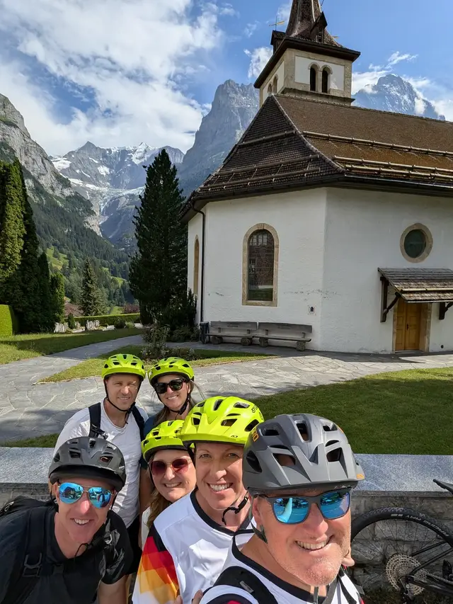 The group outside the Reformed church in Grindelwald
