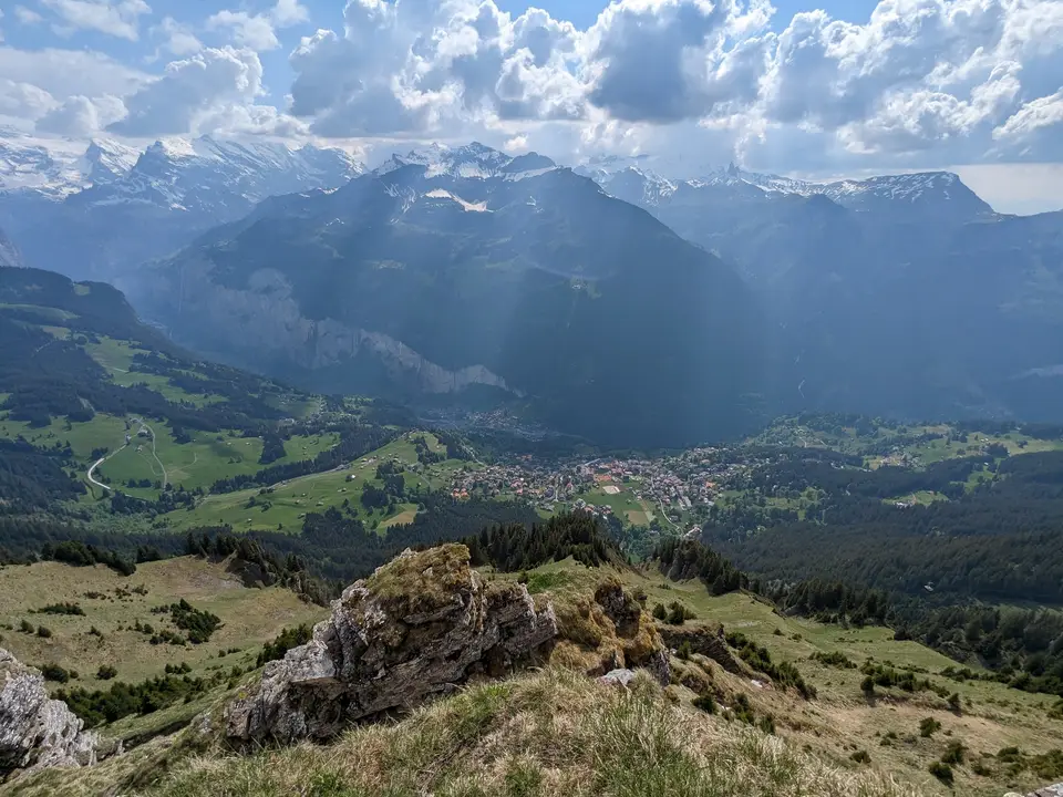 Haze in the valley, peaks beyond