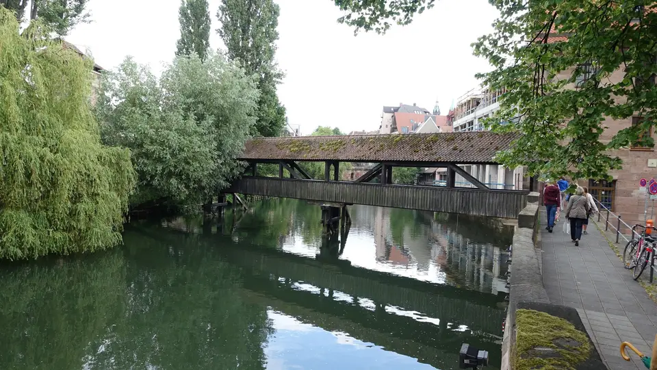 The covered wooden footbridge