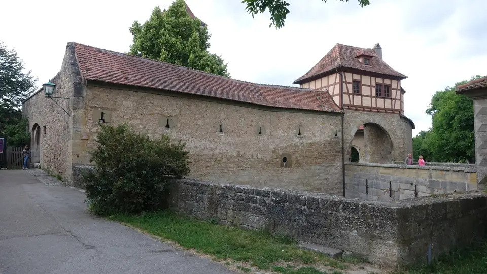 The long outer wall and its gatehouse