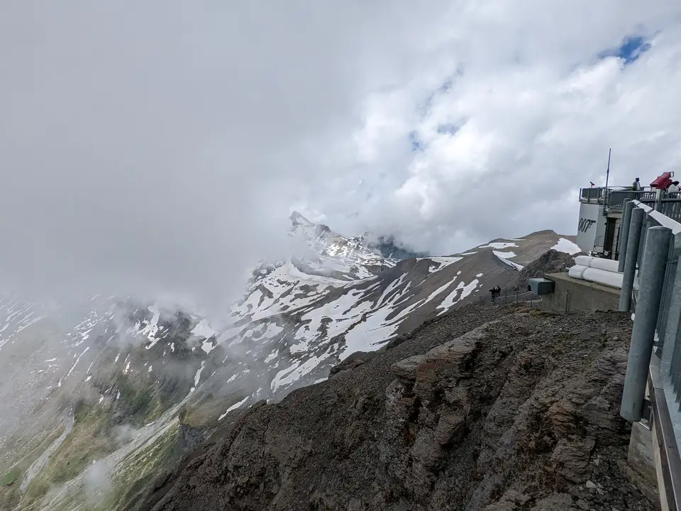 The station buildings on the rock, cloud rising