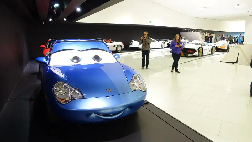 The blue show car out on the museum floor